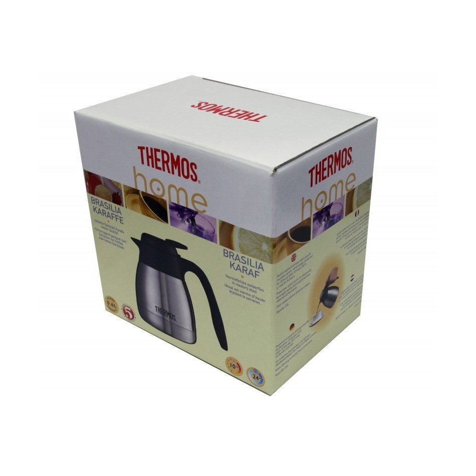 Thermospannu Brasilia TGS-600 0,6 L - Termoskaadin alkuperäispakkauksessa, jossa näkyy tuotteen kuva ja ominaisuudet.