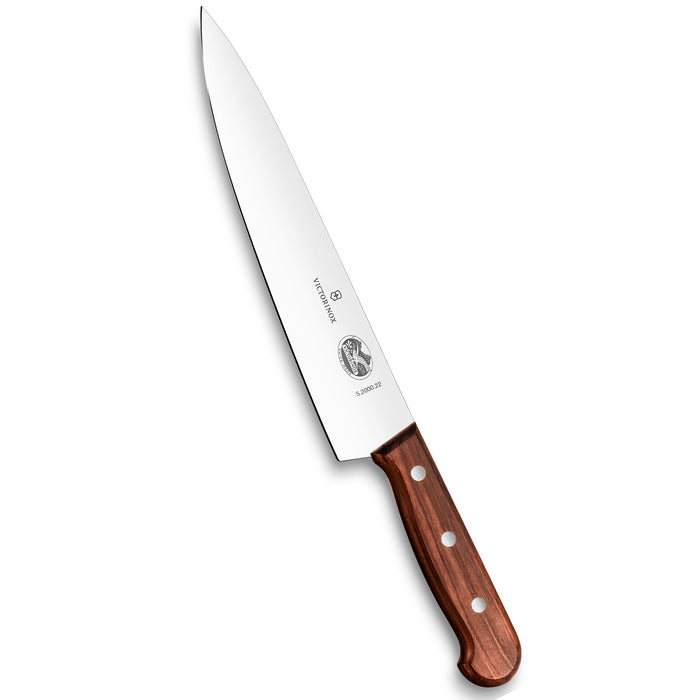 Victorinox kokkiveitsi, 22 cm ruostumaton teräs terä ja ergonominen puukahva. Tyylikäs ja kestävä veitsi monipuoliseen ruoanlaittoon.